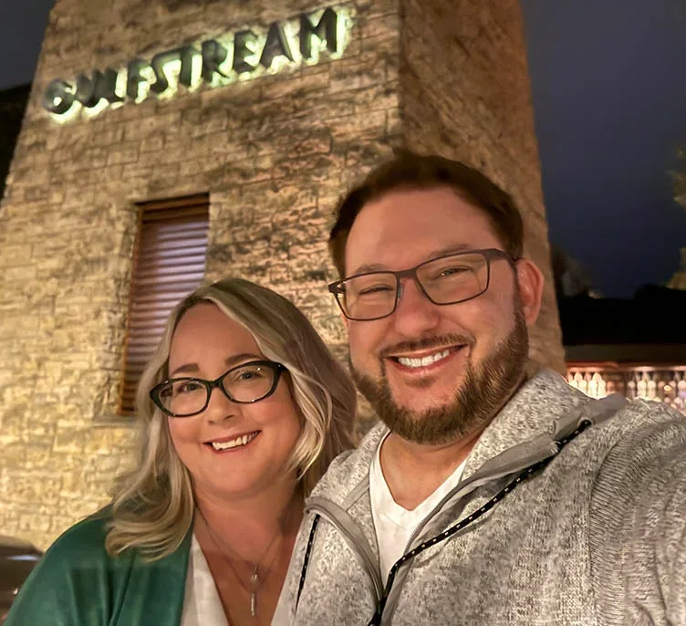 Peter and Katie, the two owners, photographed together on an evening out