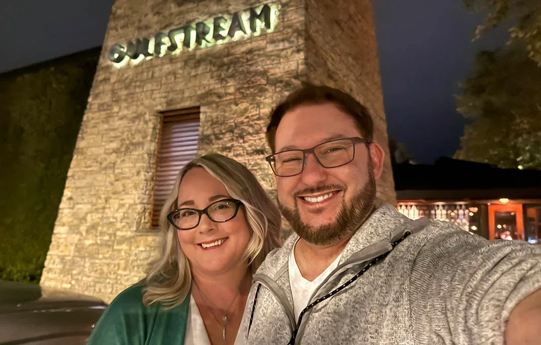 Peter and Katie, the two owners, photographed together on an evening out